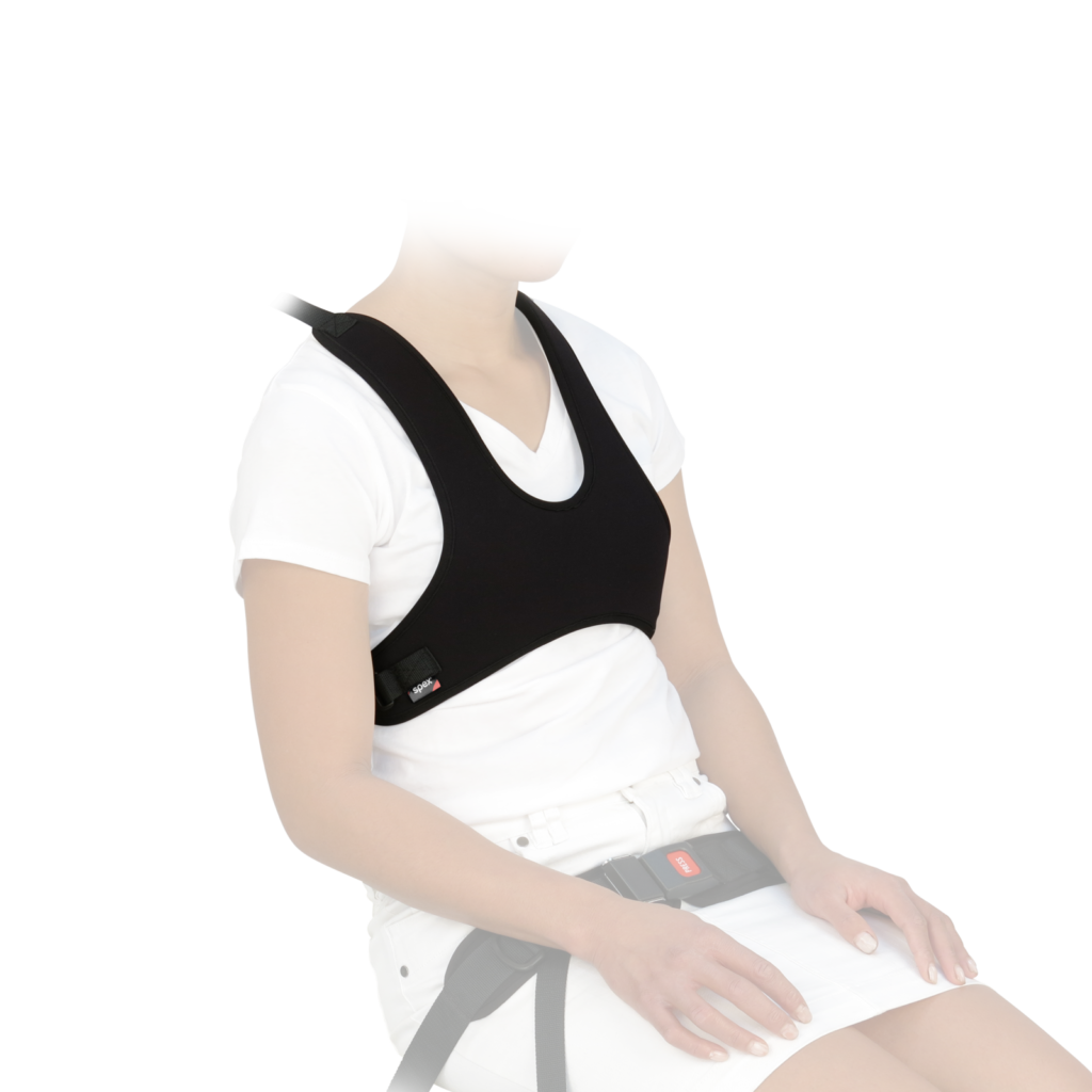 Spex CentrePoint Shoulder Harness worn by client, providing secure upper body support for better posture and trunk control when seated