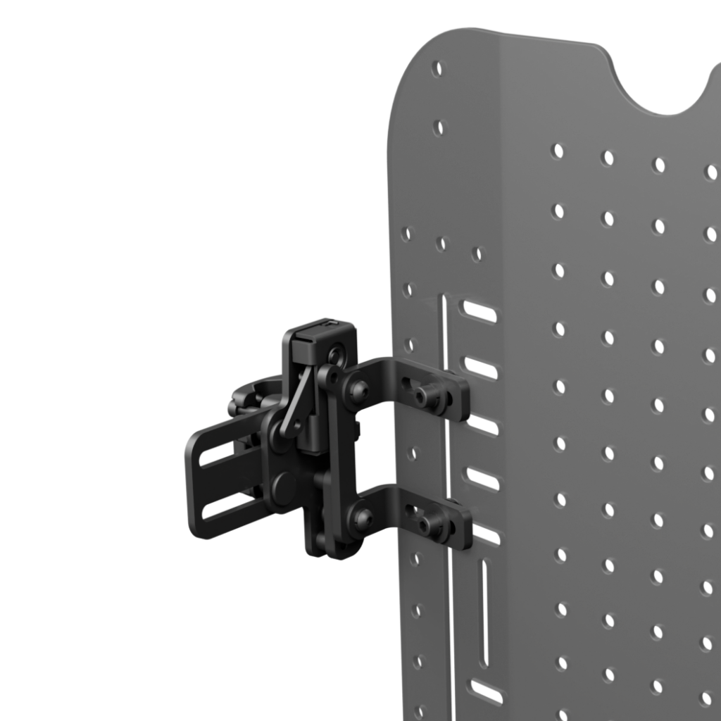 Spex single mount hardware shown connected to the hardware of a backrest. It is darker then the rest of the image.