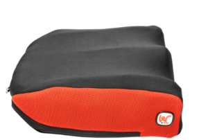 Side on view of Wonderseat SuperHigh Contour Cushion with Spex Red Chilli Covers.